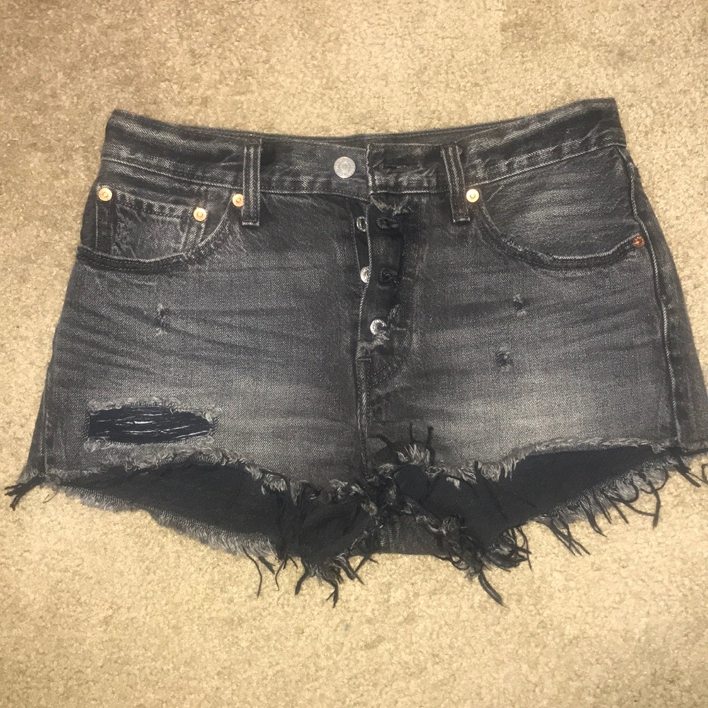 Levi’s 501 distressed black high waisted shorts